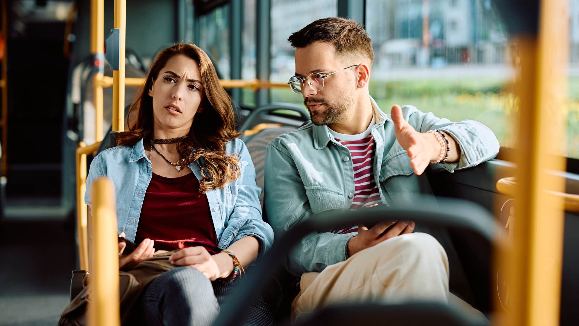 man telling date whatever works for you on a bus