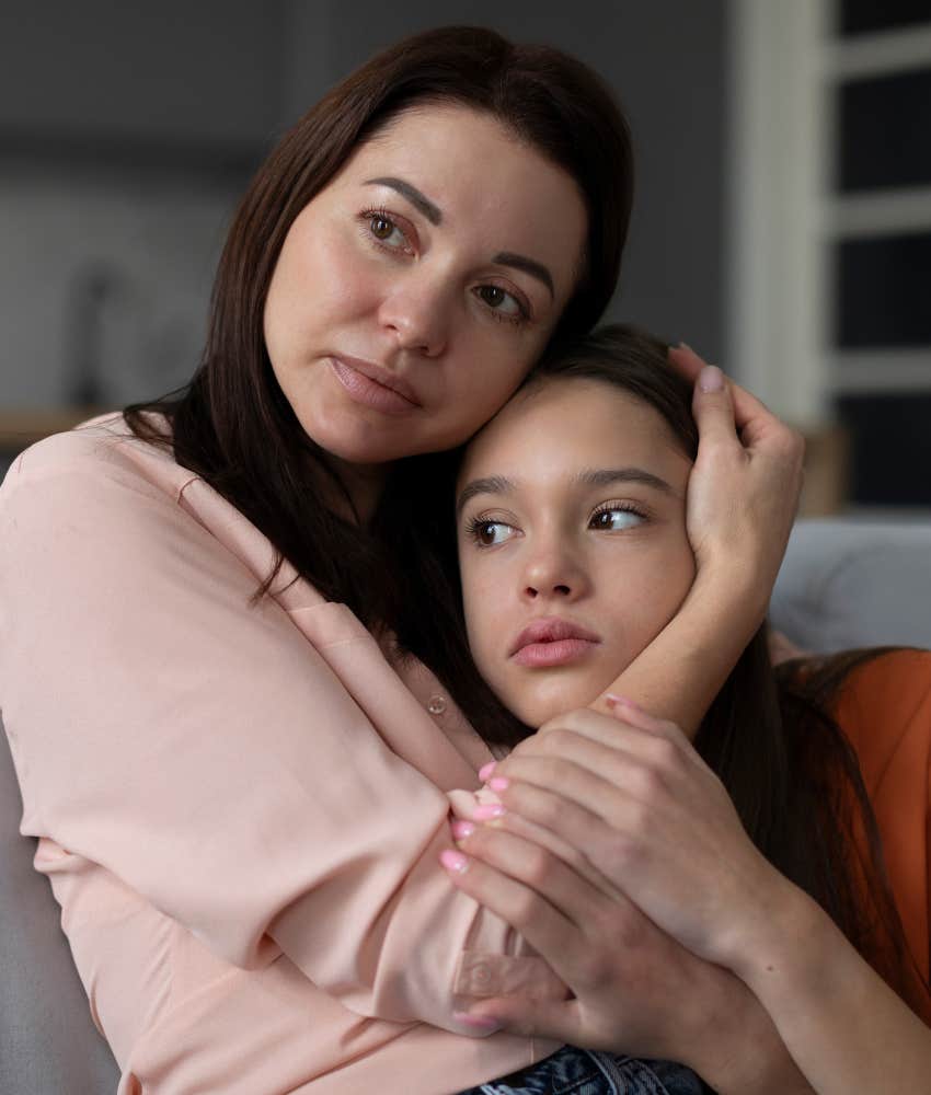 Healthy kid cries in mother's arms