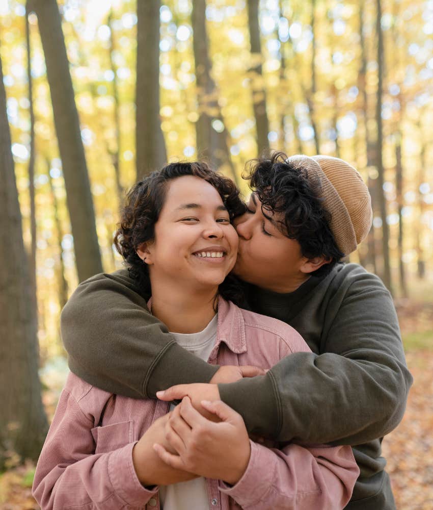 Connected couple kiss