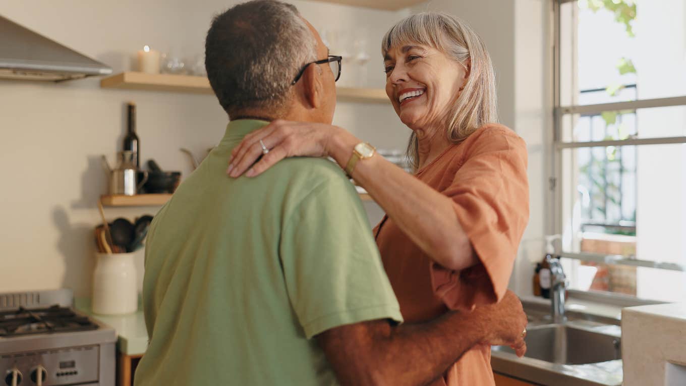 Couple smiling and creating rituals and routines together.