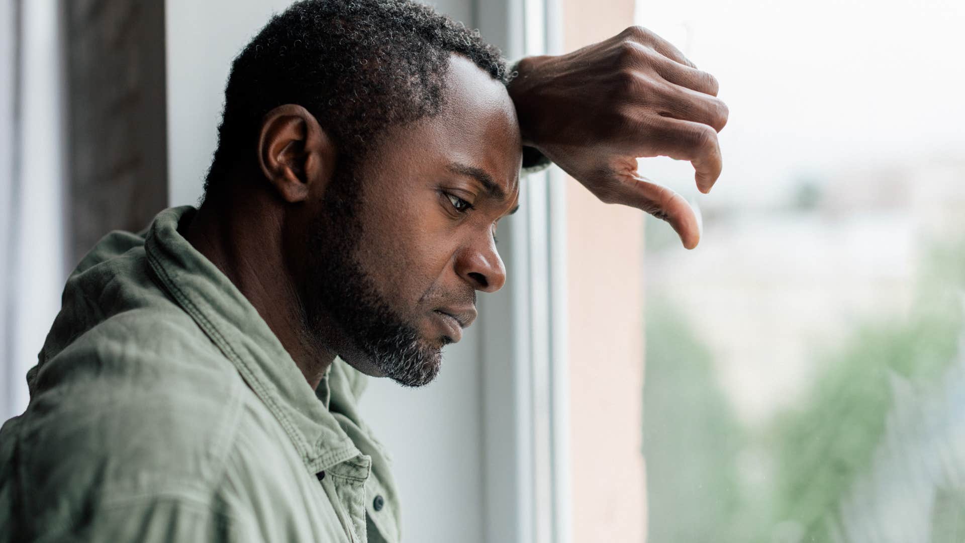 man stressed believing he has baggage from the past