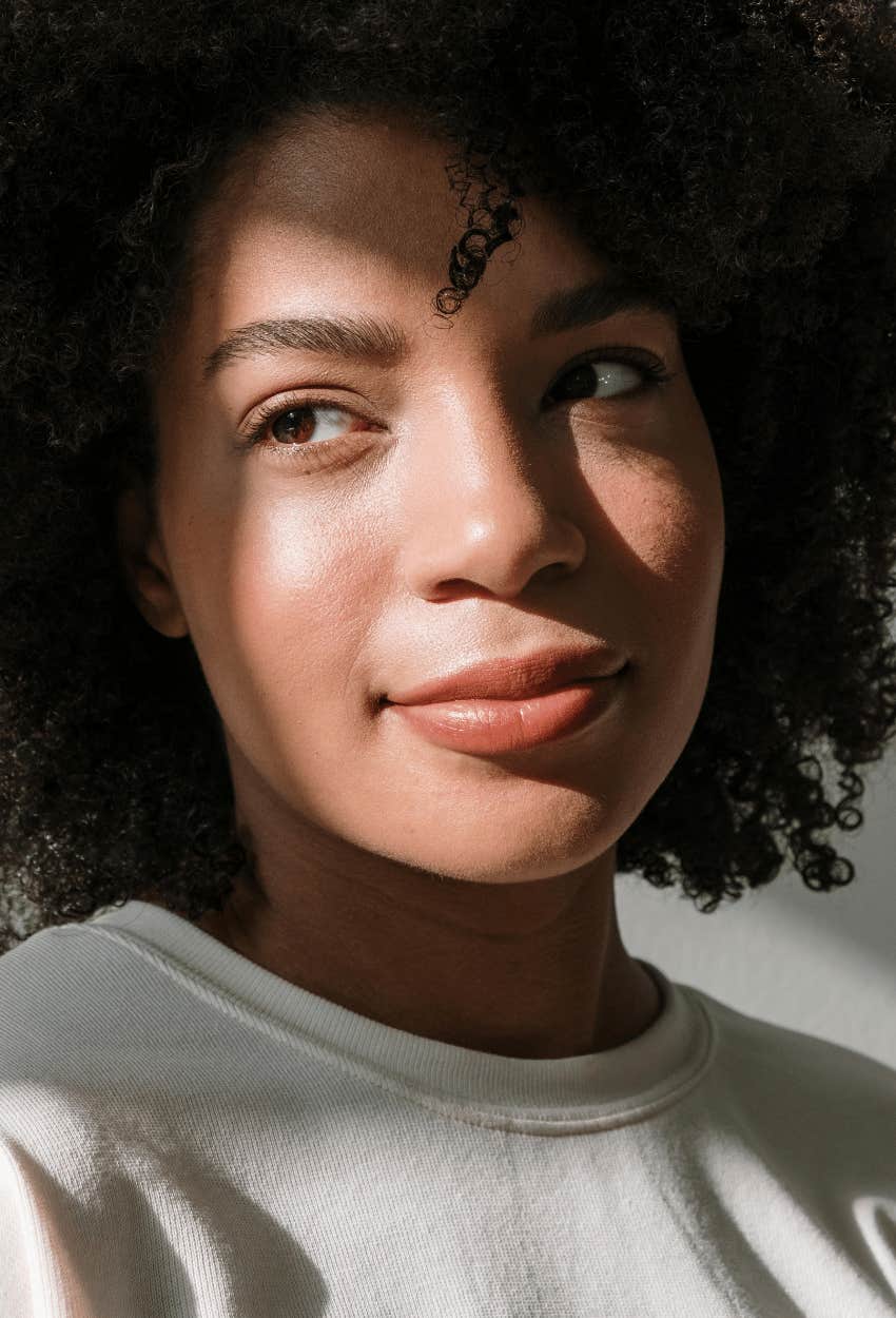 calm woman showing feminine tranquility as a quality attractive women naturally have