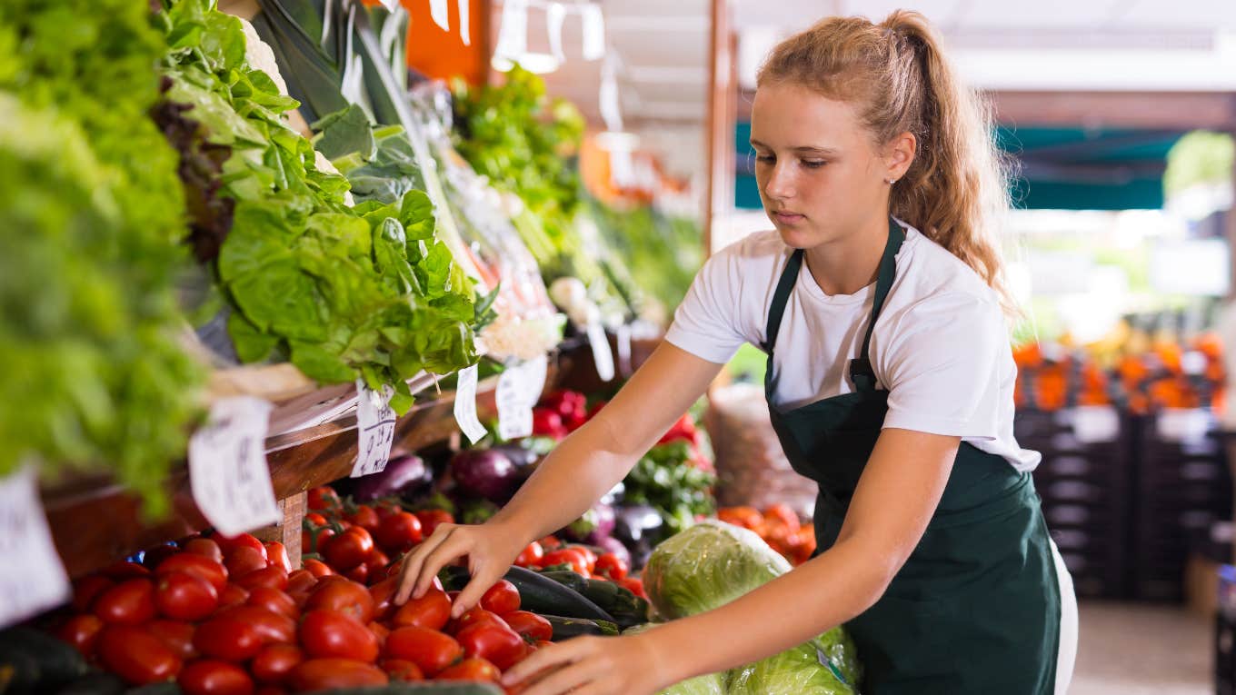 young teen working grocery store job