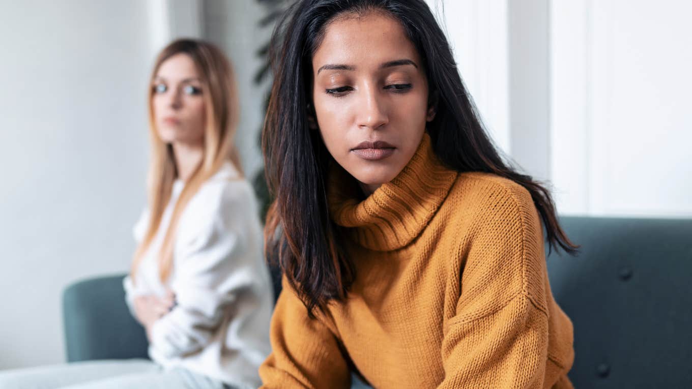 Frustrating Habits Of People Who Feel Entitled To Your Time And Energy woman turned away from friend who feels entitled to her time and energy
