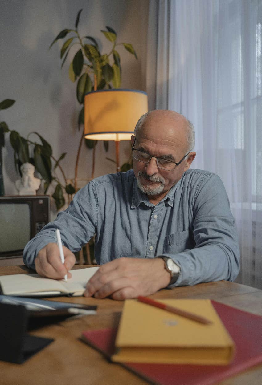 grandfather writing cursive letter
