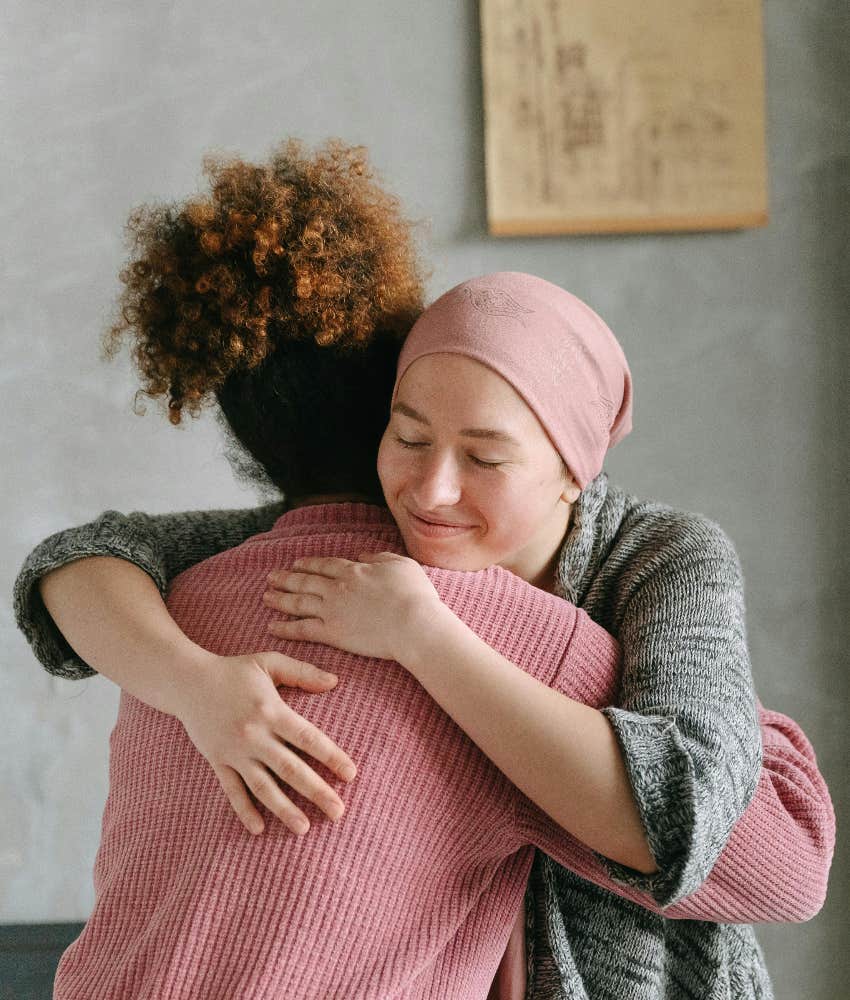 cancer patient hugging a caregiver