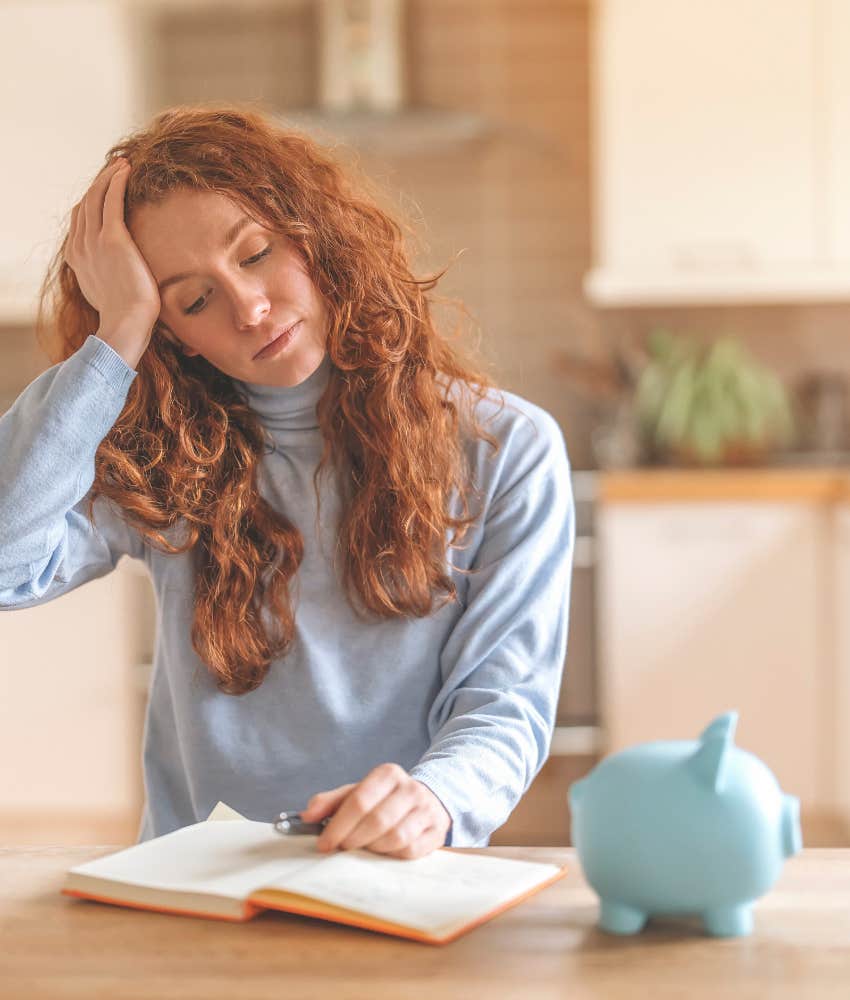 Woman writes in journal to manage anxiety