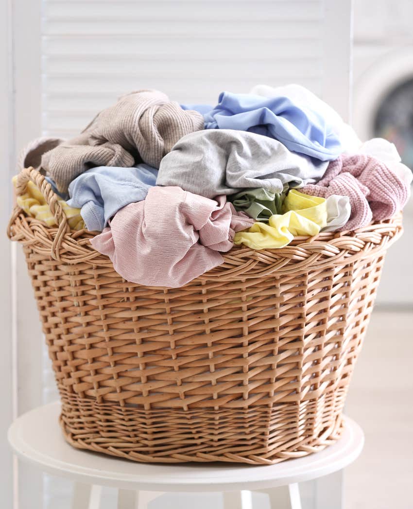 basket of laundry wife left out for husband to clean