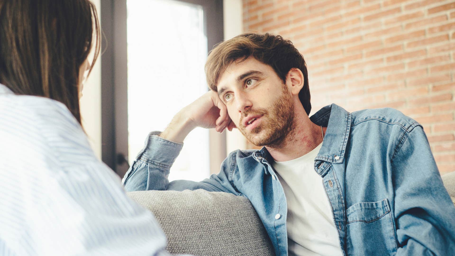 man carving out time for partner as he listens to her talk with rapid attention