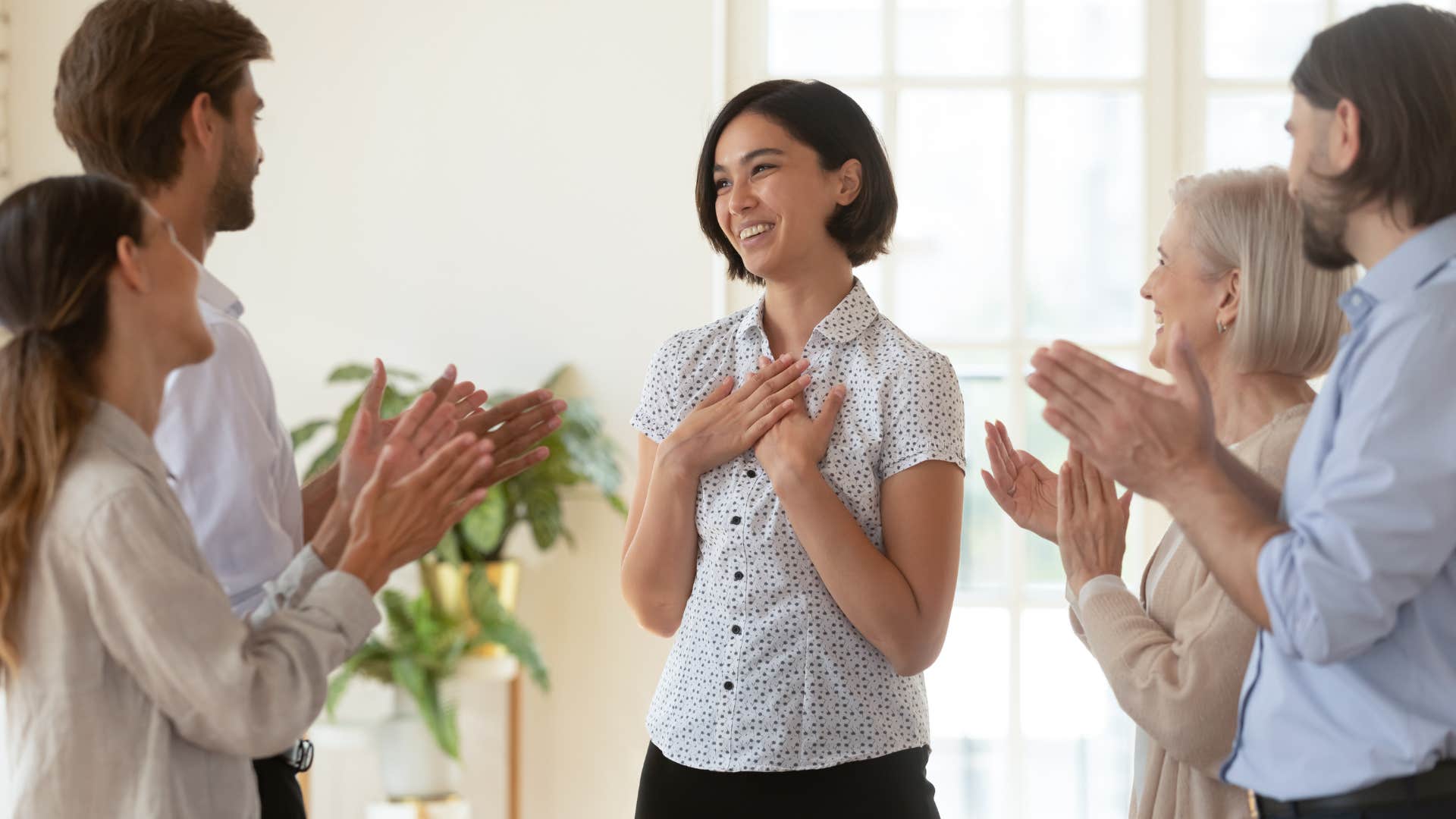 woman encouraged to chase her dreams as she is gifted flowers 