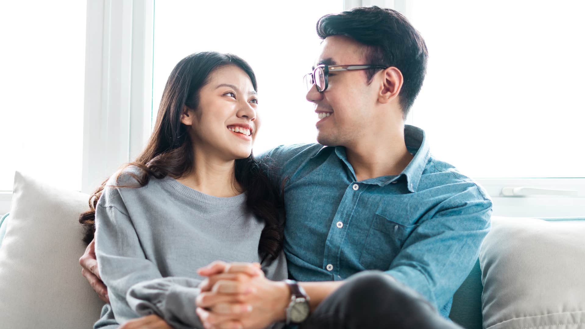 man in denim shirt hugging woman woman and expressing genuine gratitude 