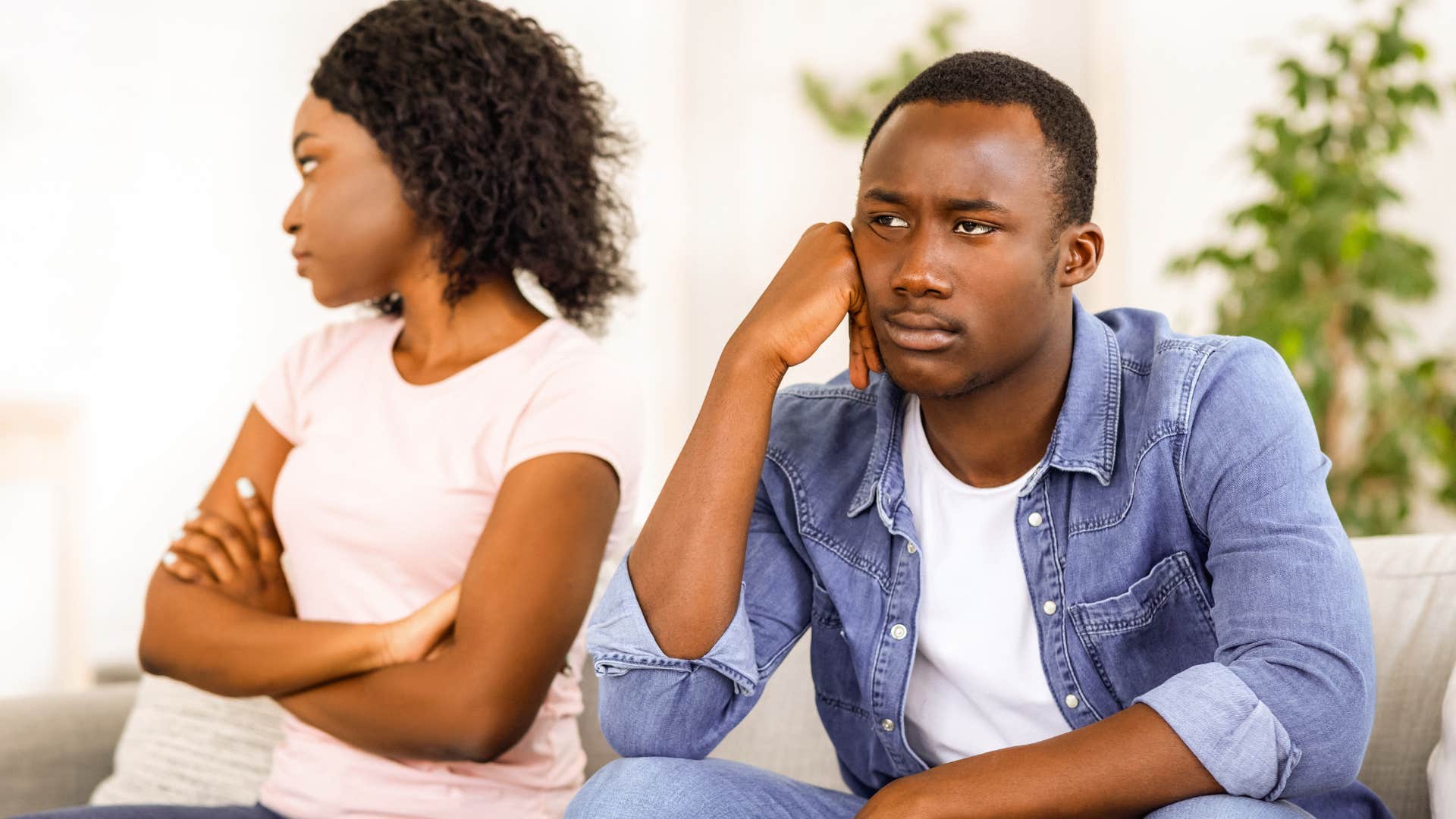 man turned away his wife thinking about their stagnant relationship