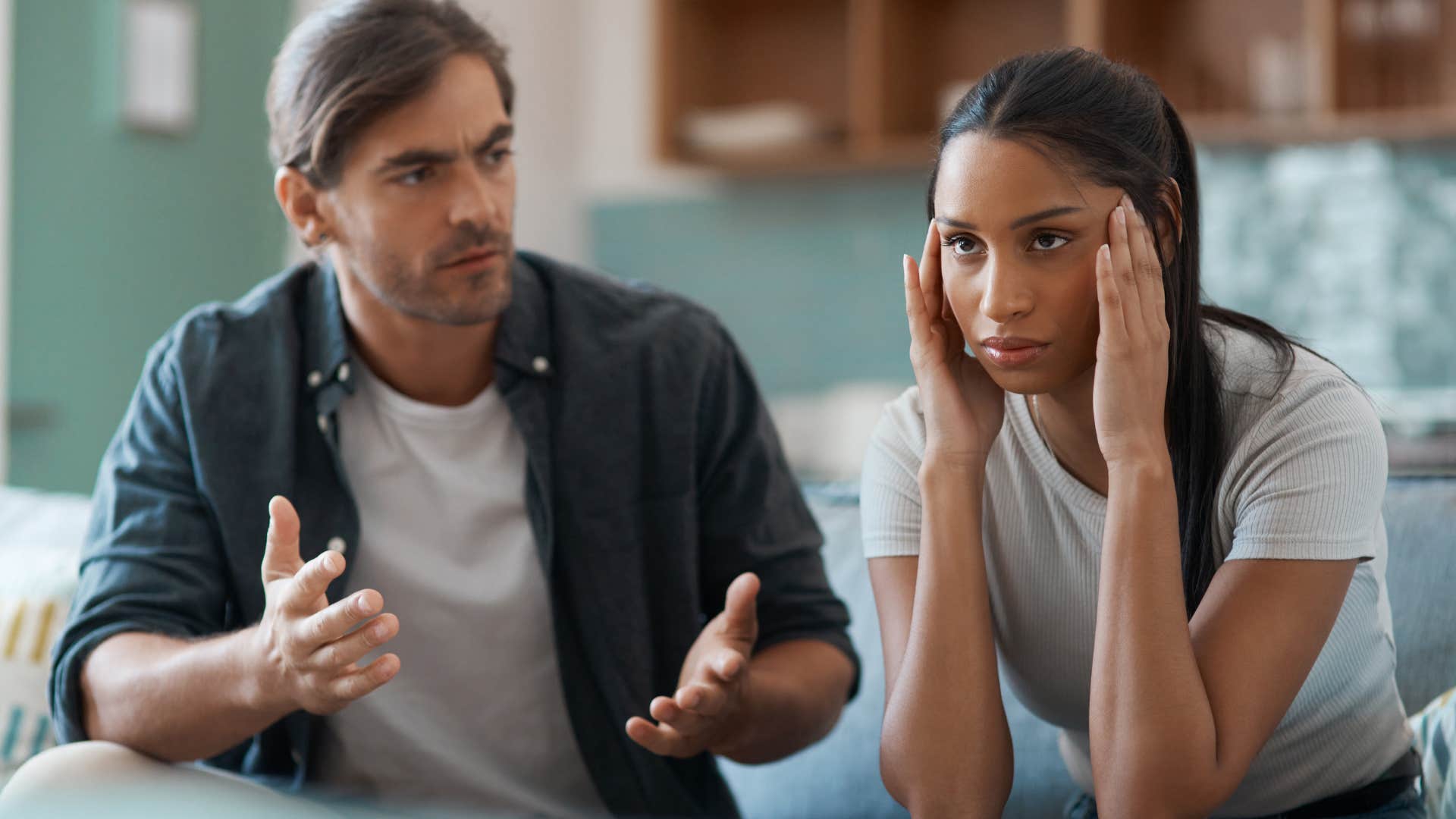 woman looking away from husband who feels unappreciated