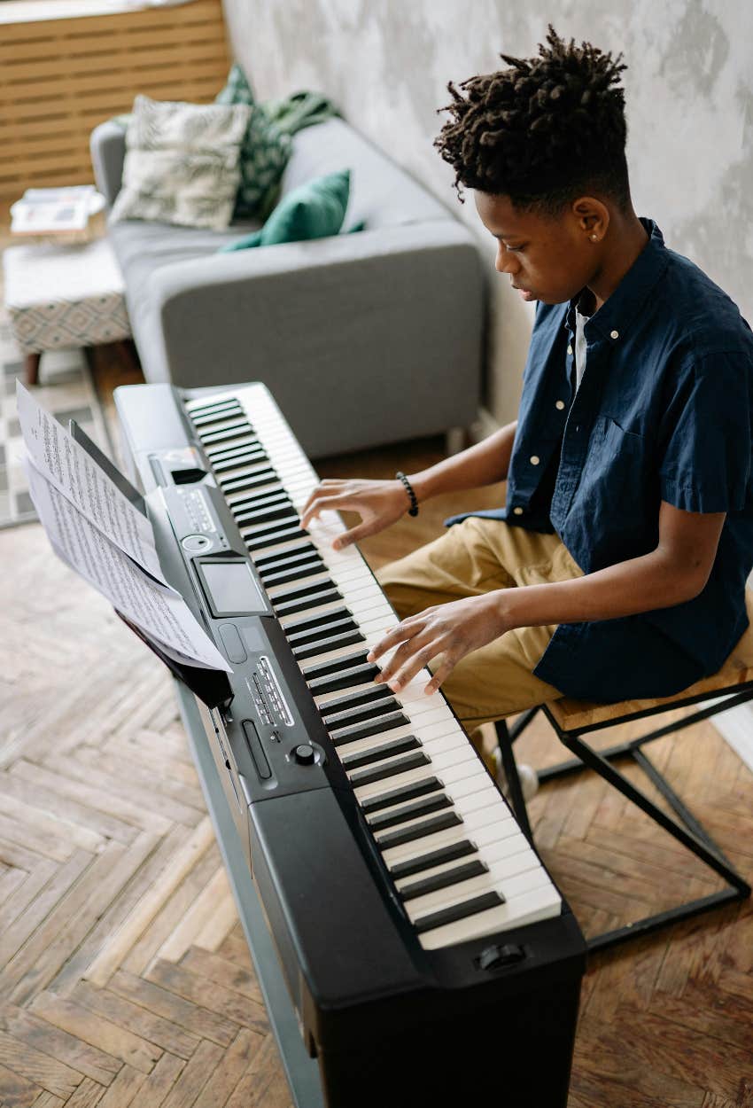 Boy learning piano early life become successful adult