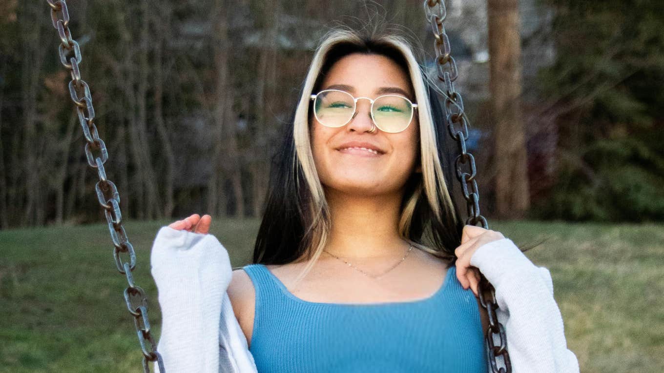 These Life Decisions Have The Rare Ability To Change The Entire Trajectory Of Your Life, According To Experts Woman changing entire trajectory of life.
