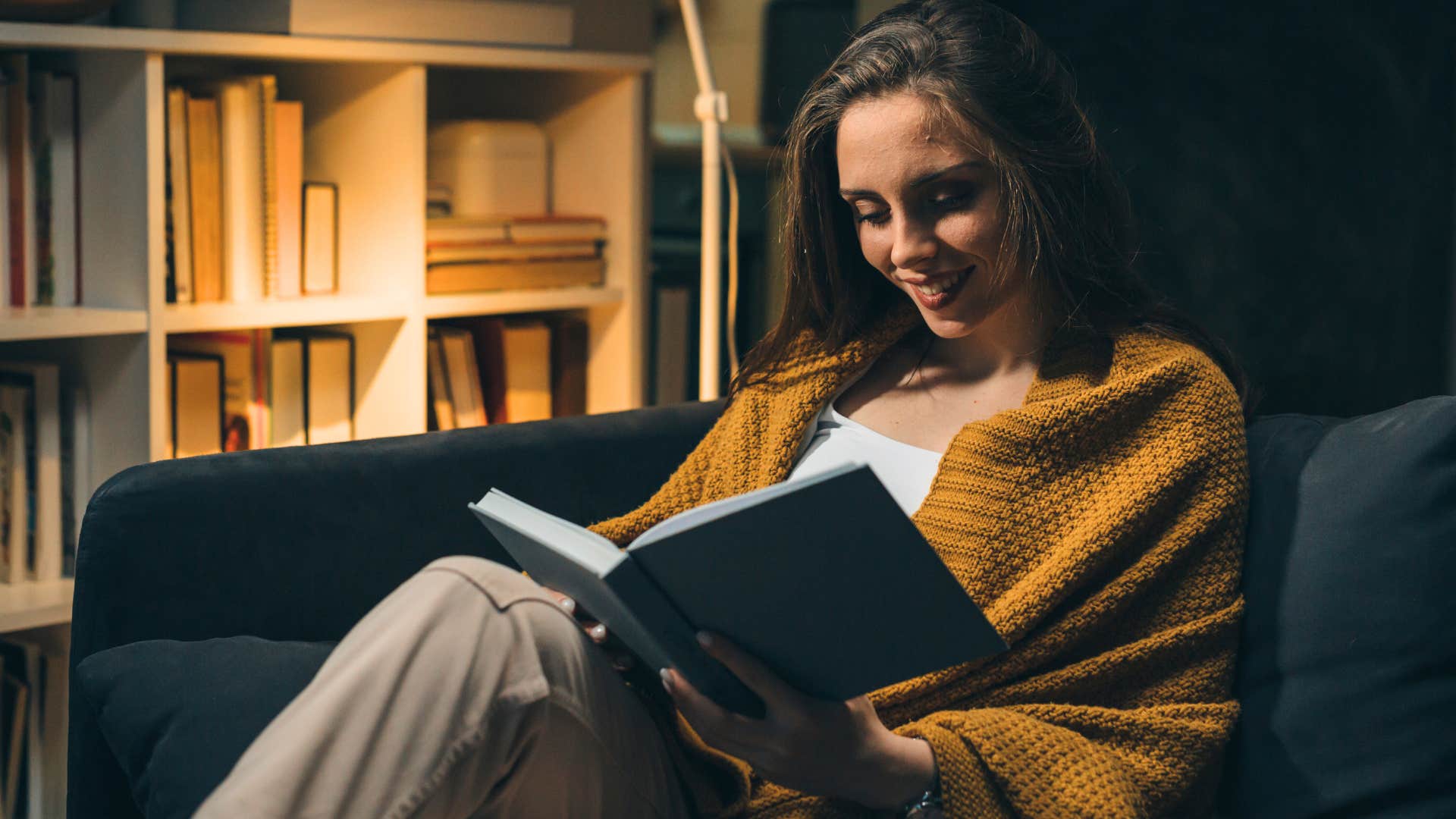 woman reading in natural light and soft lighting