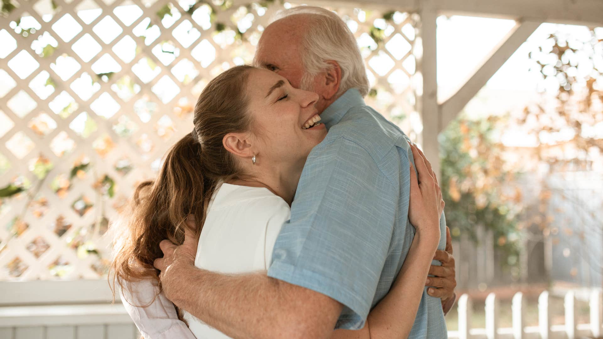good dads show love to their adult kids by hugging
