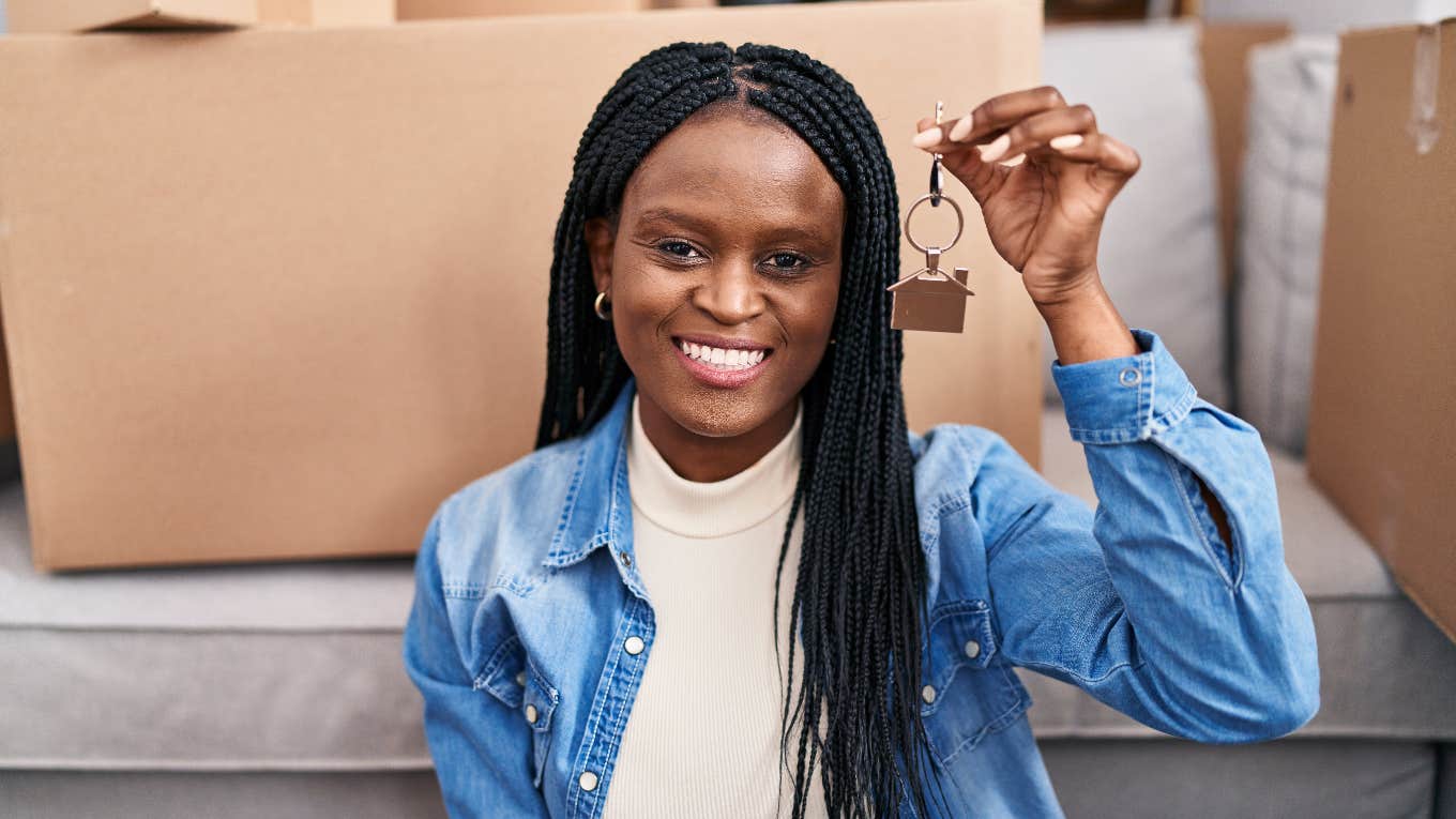 Mom Surprises Her Children With Keys To Their New House mom holding key to her new house
