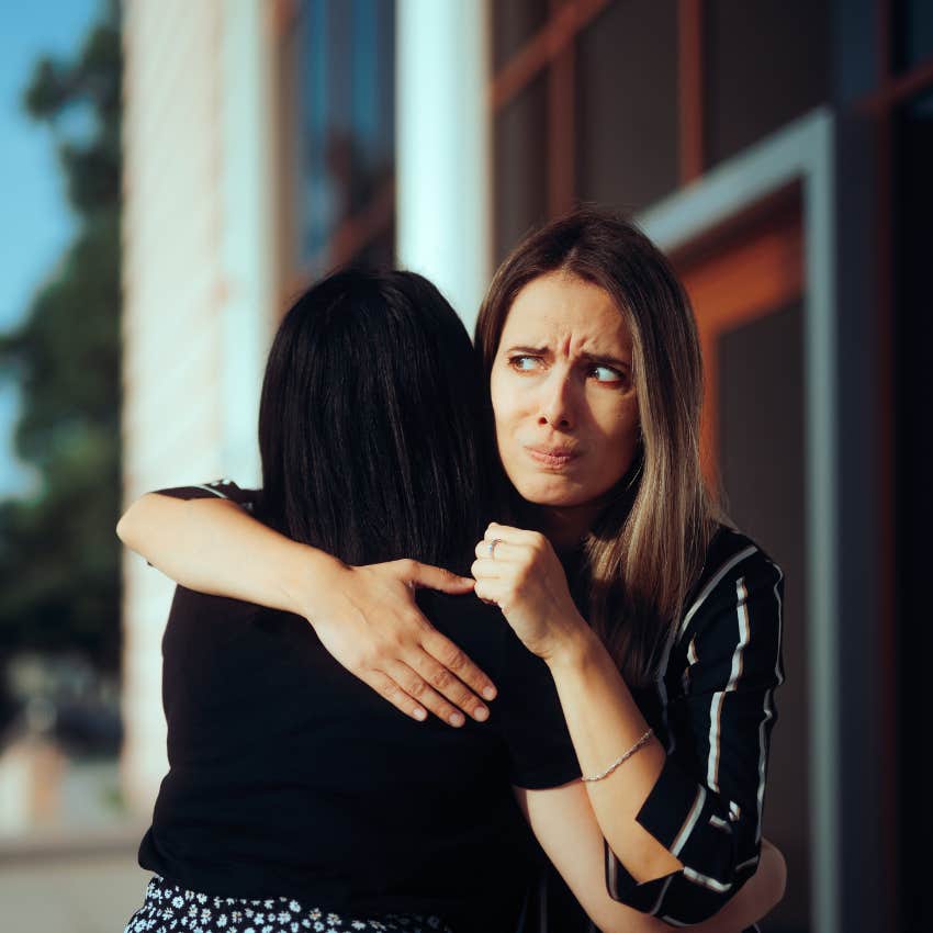 woman hugging an emotionally draining friend