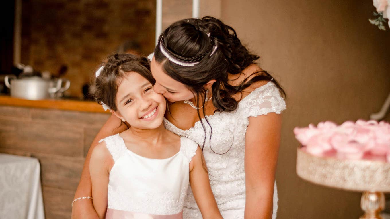 Newly Married Mom Created An Autism-Friendly Wedding So Her Daughter Could Enjoy The Event newly married mom and her autistic daughter at wedding