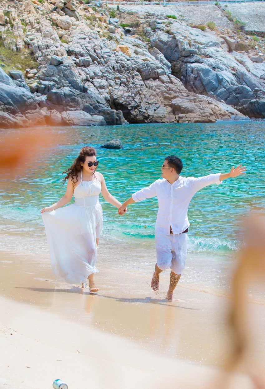 newlyweds on a beach