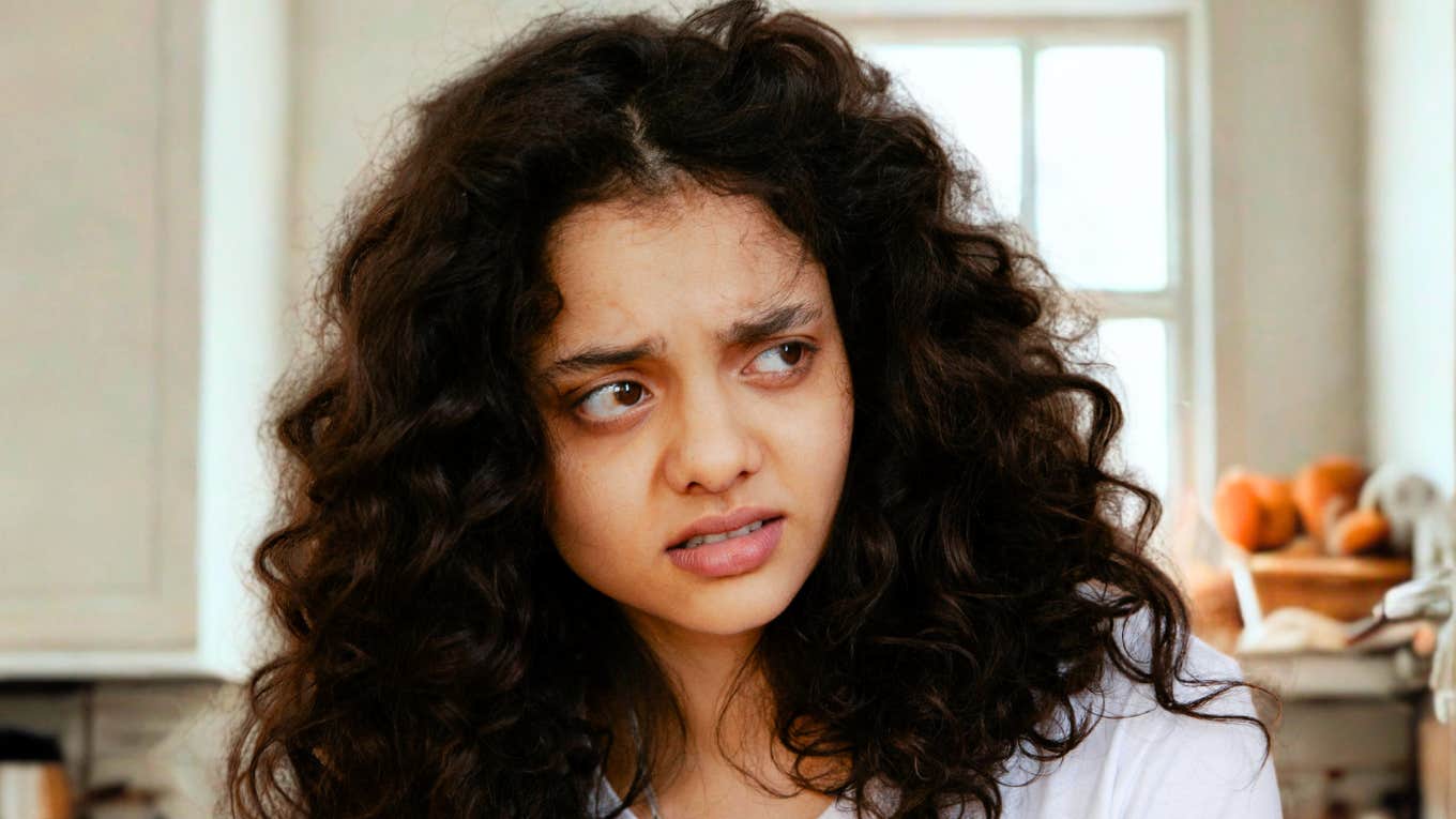 Experts Say These ‘No Big Deal’ Habits Are Actually Major Relationship Wreckers Woman thinking the 'no big deal' habits in her relationship are majorly wrecking it.