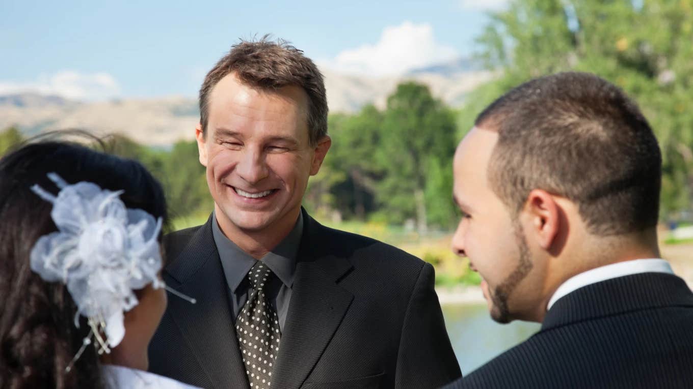 Officiant Reads Bride & Groom's Private Letters To Entire Wedding Audience officiant reading bride and groom's private letters to the entire wedding