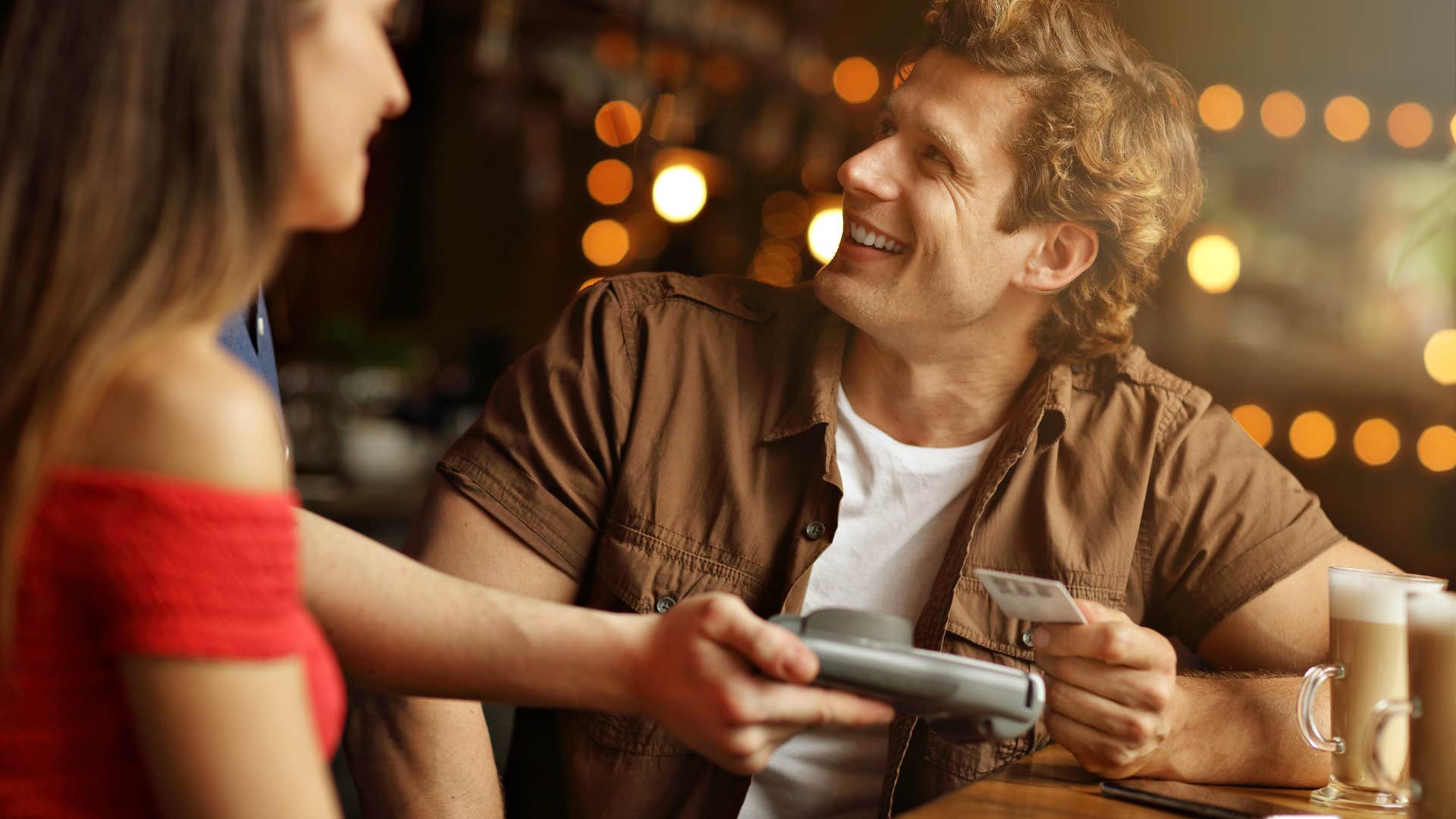 man with the old-fashioned habit of picking up tab