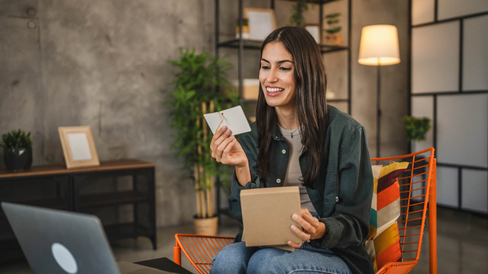 woman who is in a deeply happy relationship opening love notes