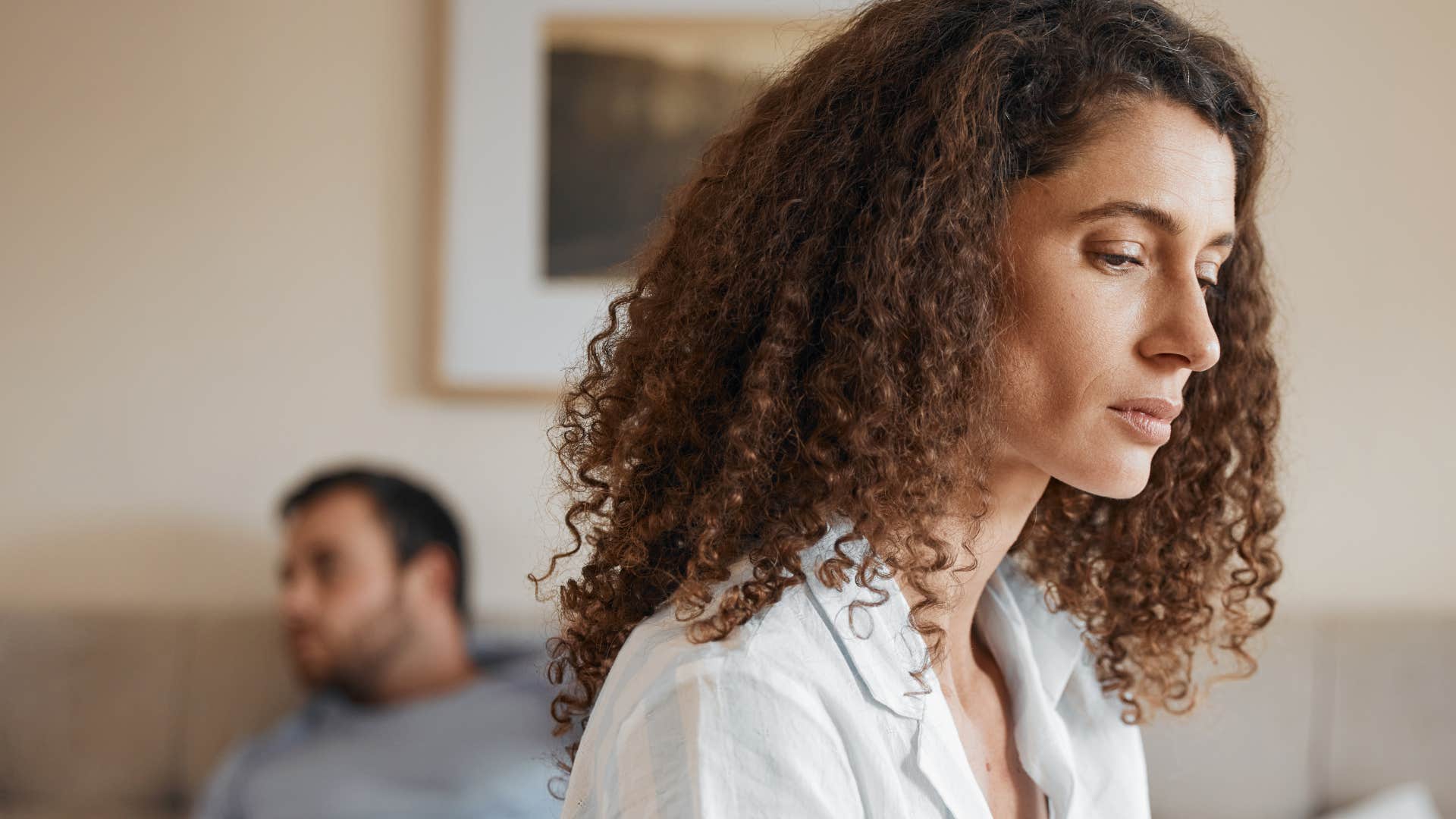woman drifting apart from people feeling lonely with partner