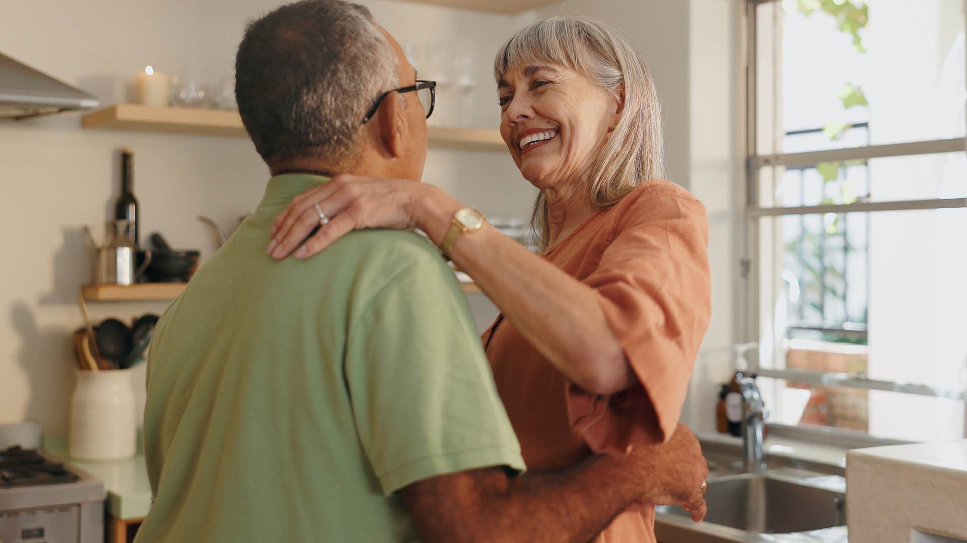 woman who knows happiness isn't about constant gratification smiling with her partner