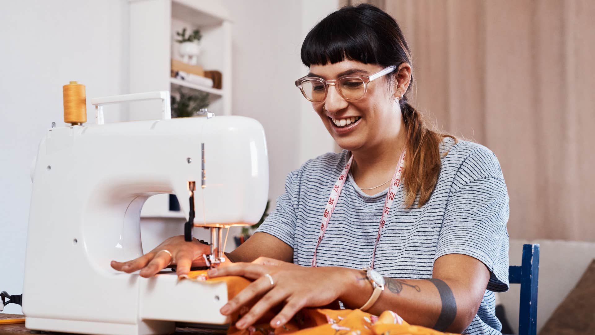 woman making homemade gifts with sewing machine