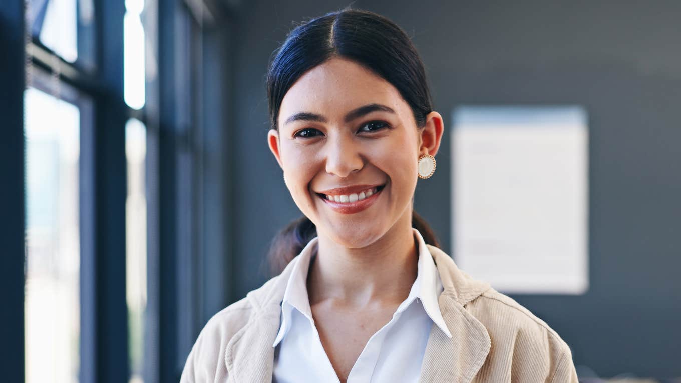 Your Parents Raised You Right If You Think These Rare Habits Are Actually Mandatory smiling professional woman with good habits