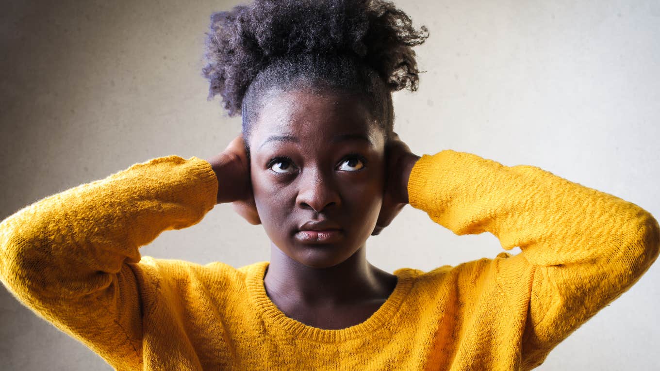 People Who Can’t Stand Hearing Others Chew Share These Traits Woman who can't stand hearing others chew