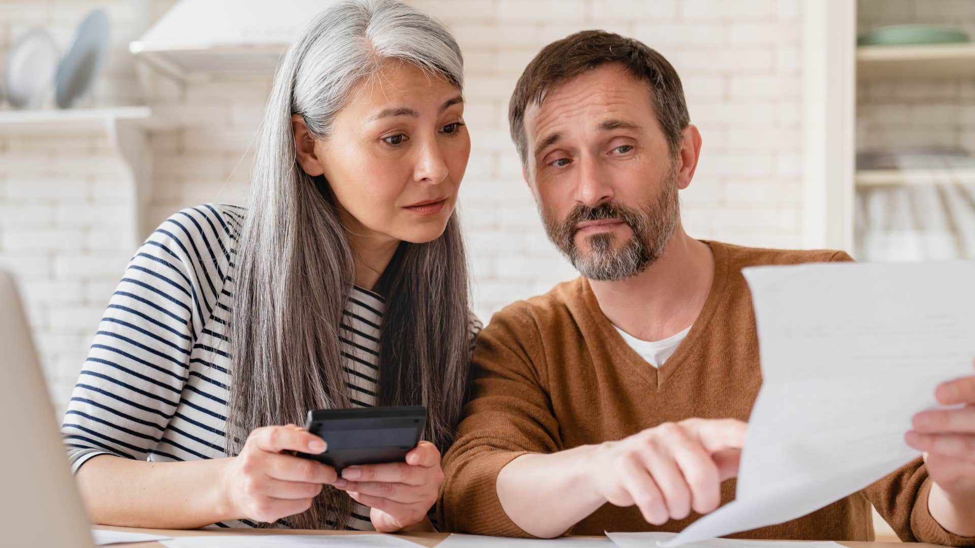 couple who's on a budget doing bills at home