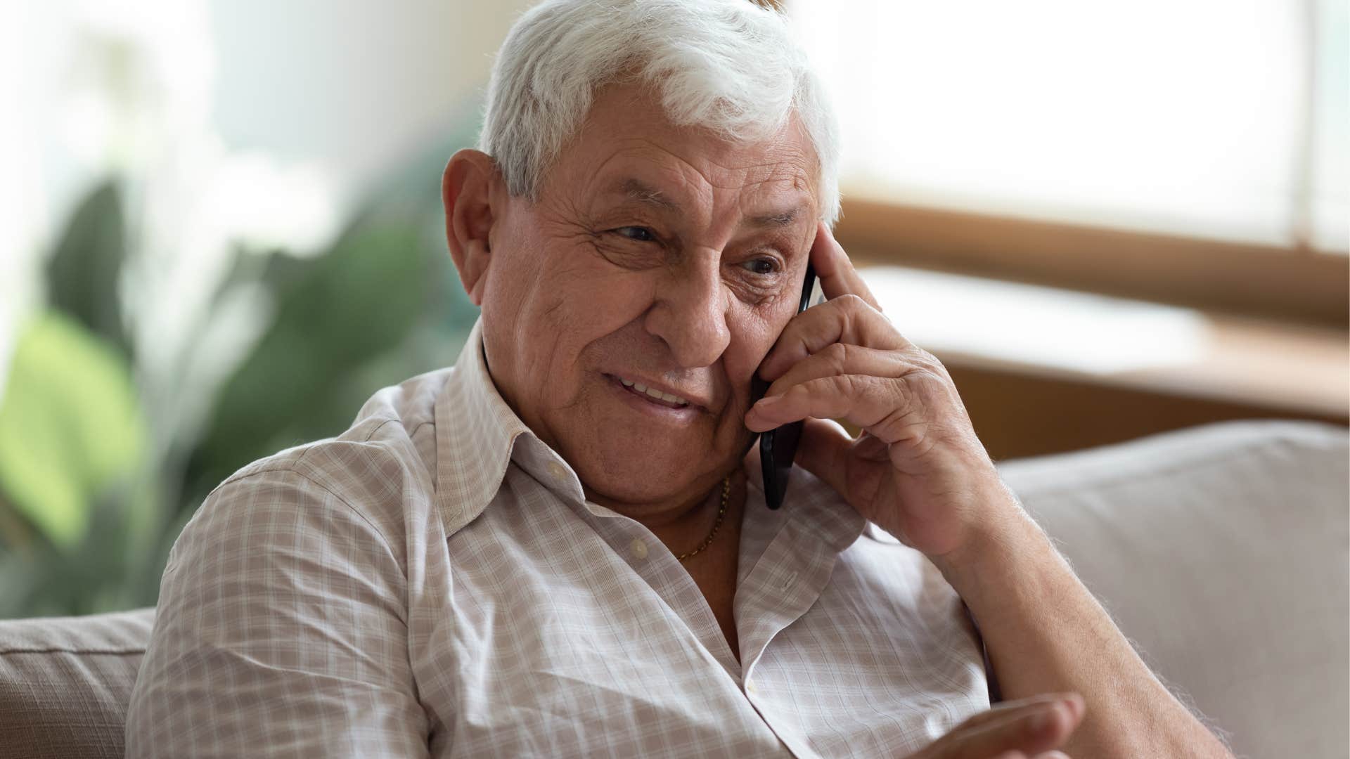 man who prefers deep and meaningful connections talking on the phone