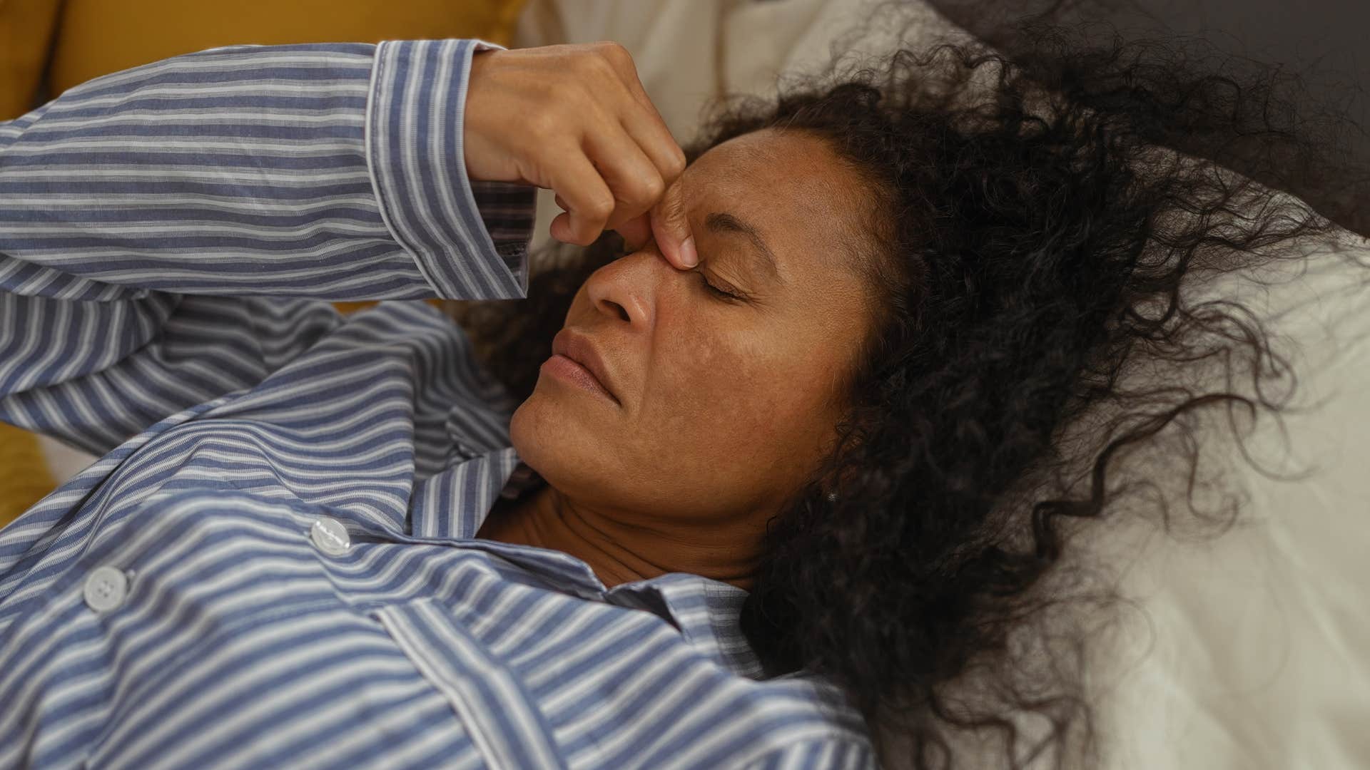 stressed older woman battling physical or mental limitations