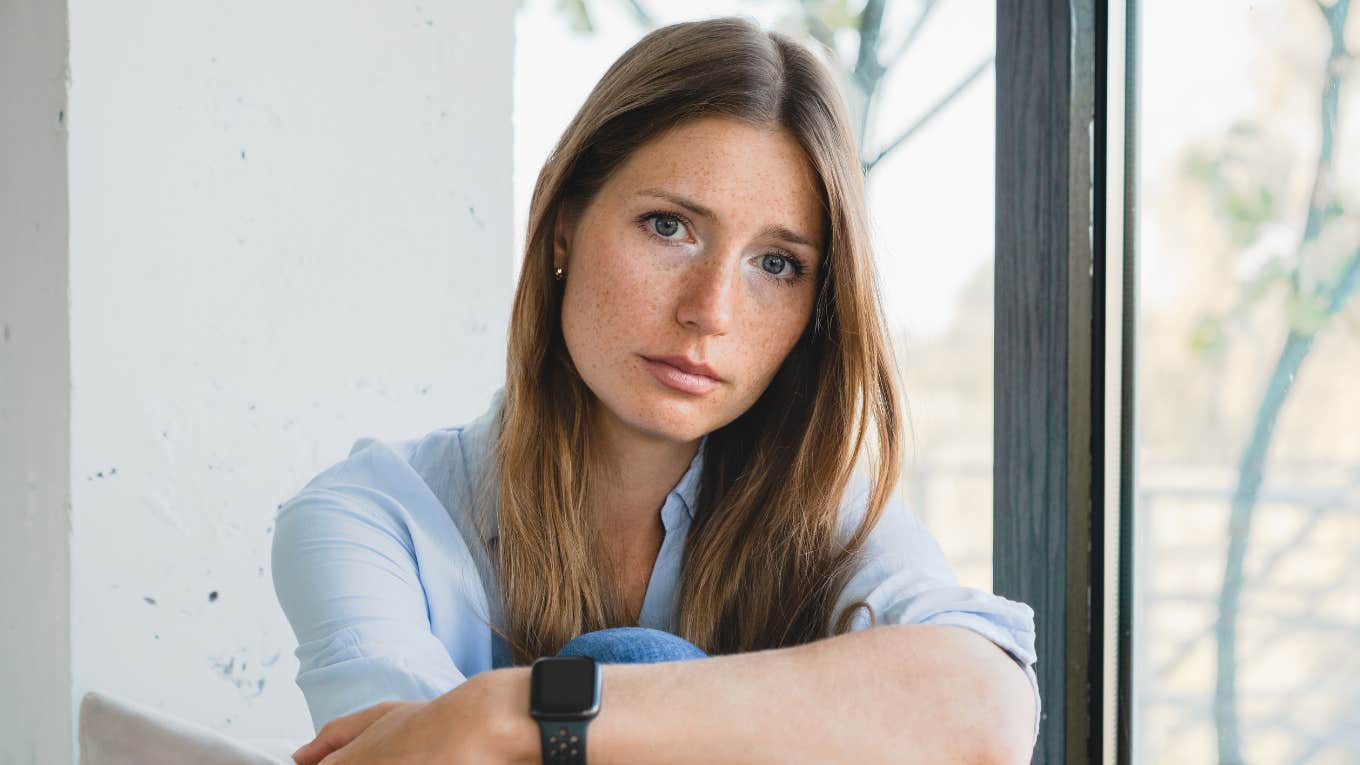 Phrases Adult Children Say When They're Deeply Unhappy But Don't Want Their Parents To Know deeply unhappy young woman not wanting parents to worry about her