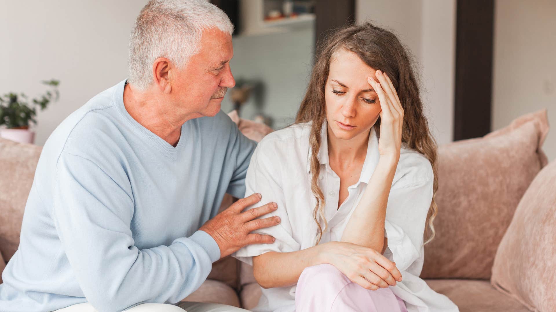 upset woman saying I'll figure it out to her dad