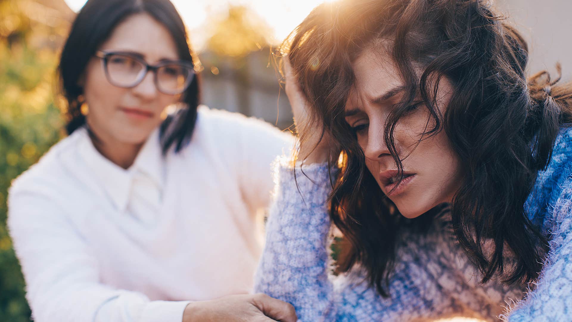 woman saying I'm fine to her concerned mother