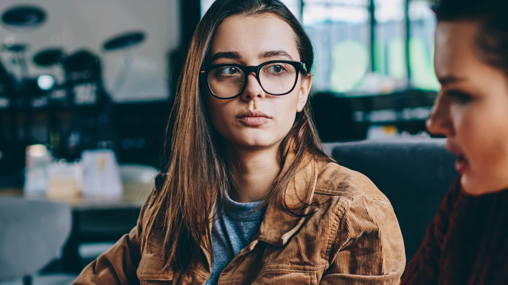woman listening to friend say let's focus on what we can control