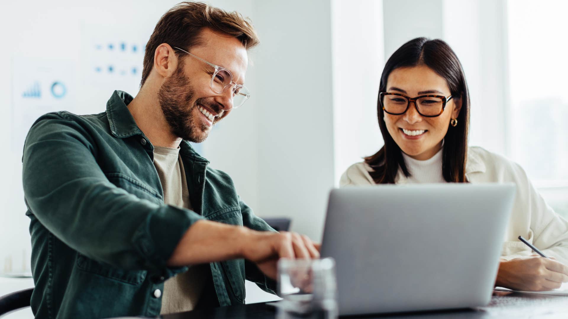 man telling his coworker to go the whole nine yards on project