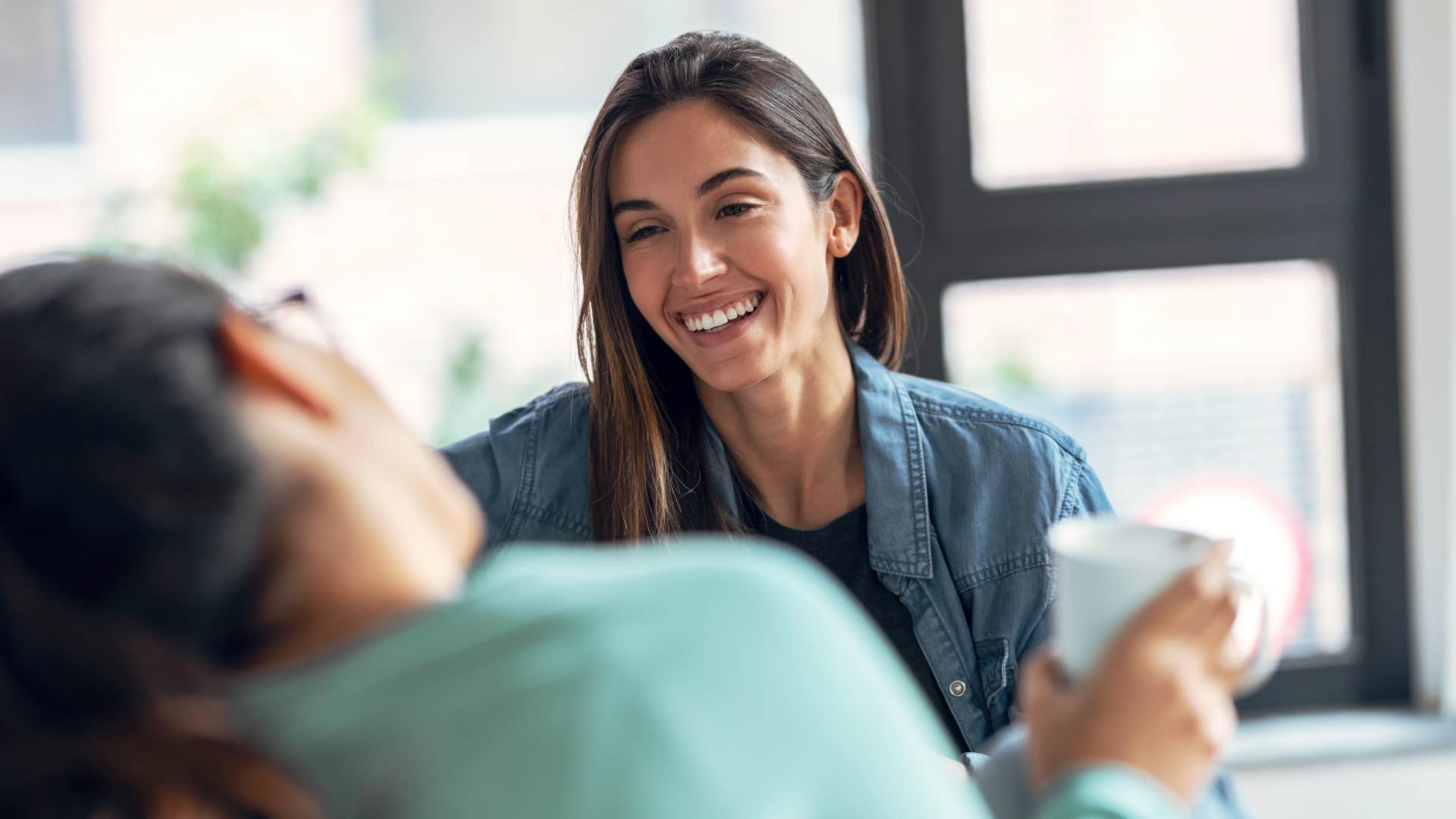 a woman tells another woman that she goes with her gut when making decisions