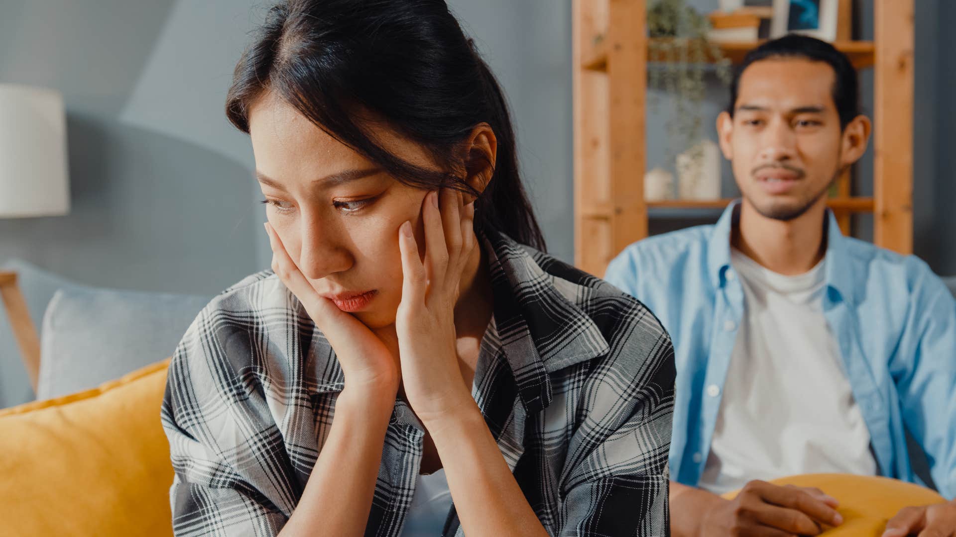 woman turned away from partner after asking what do you mean by that