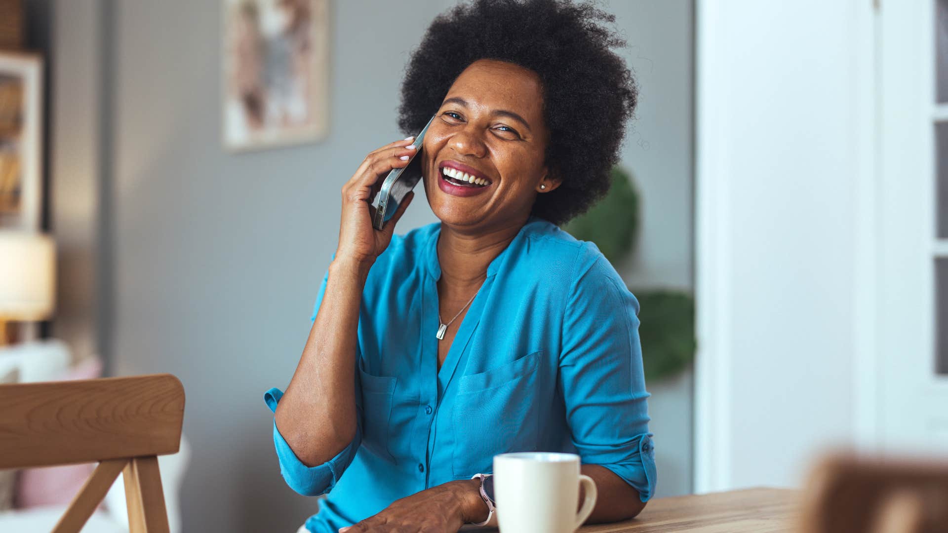 happy woman saying thank you on the phone
