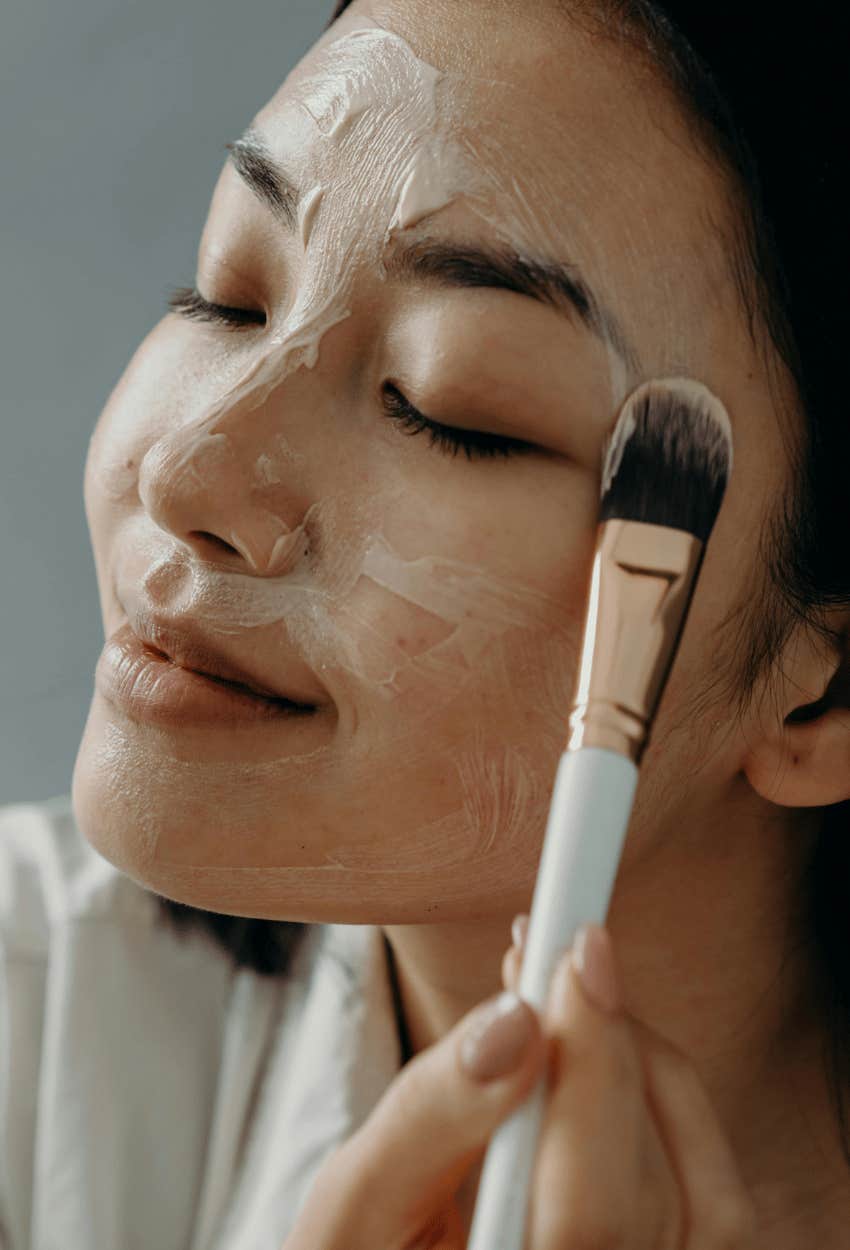 woman applying product is attractive