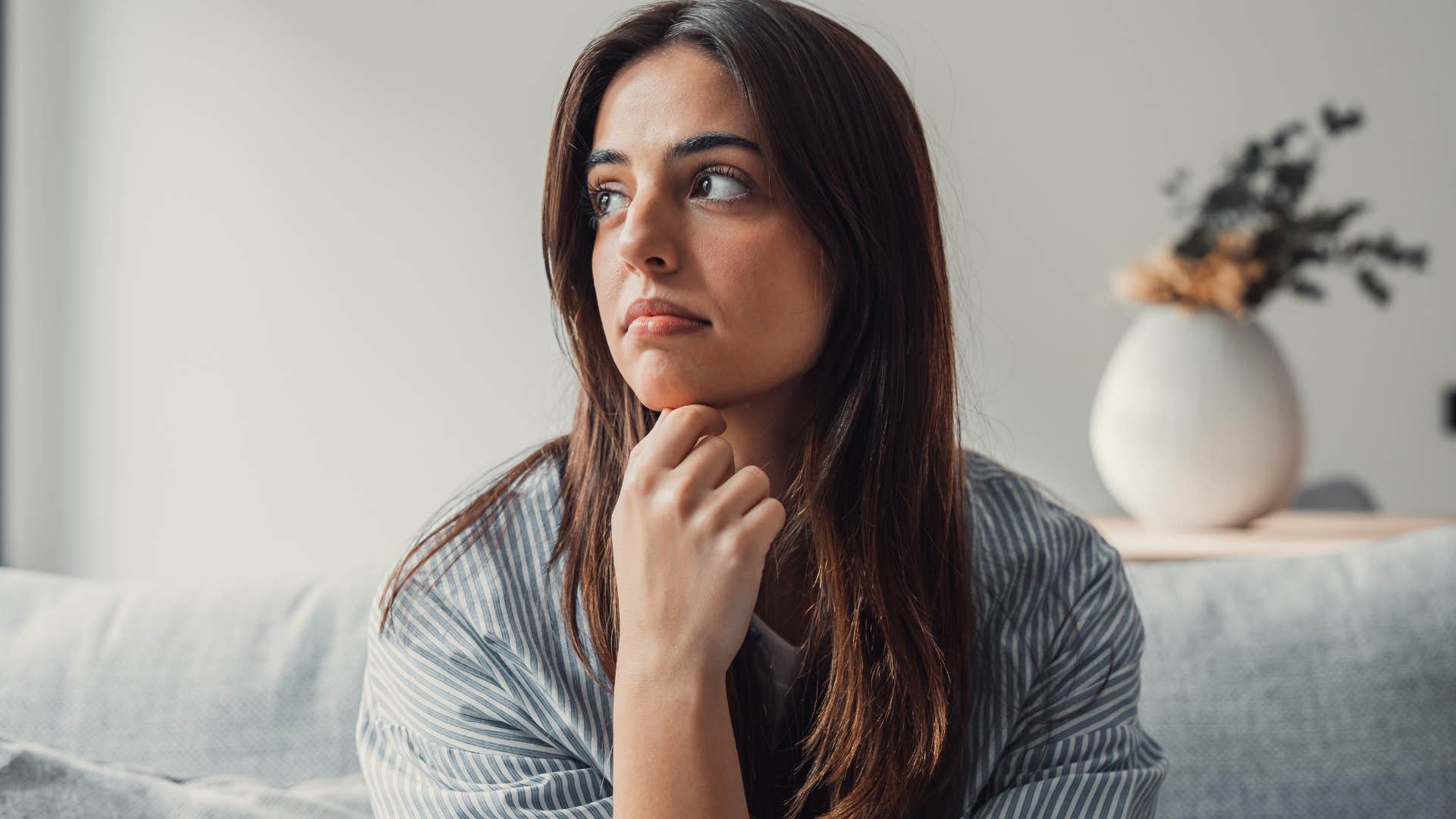 quiet pensive woman feeling misunderstood