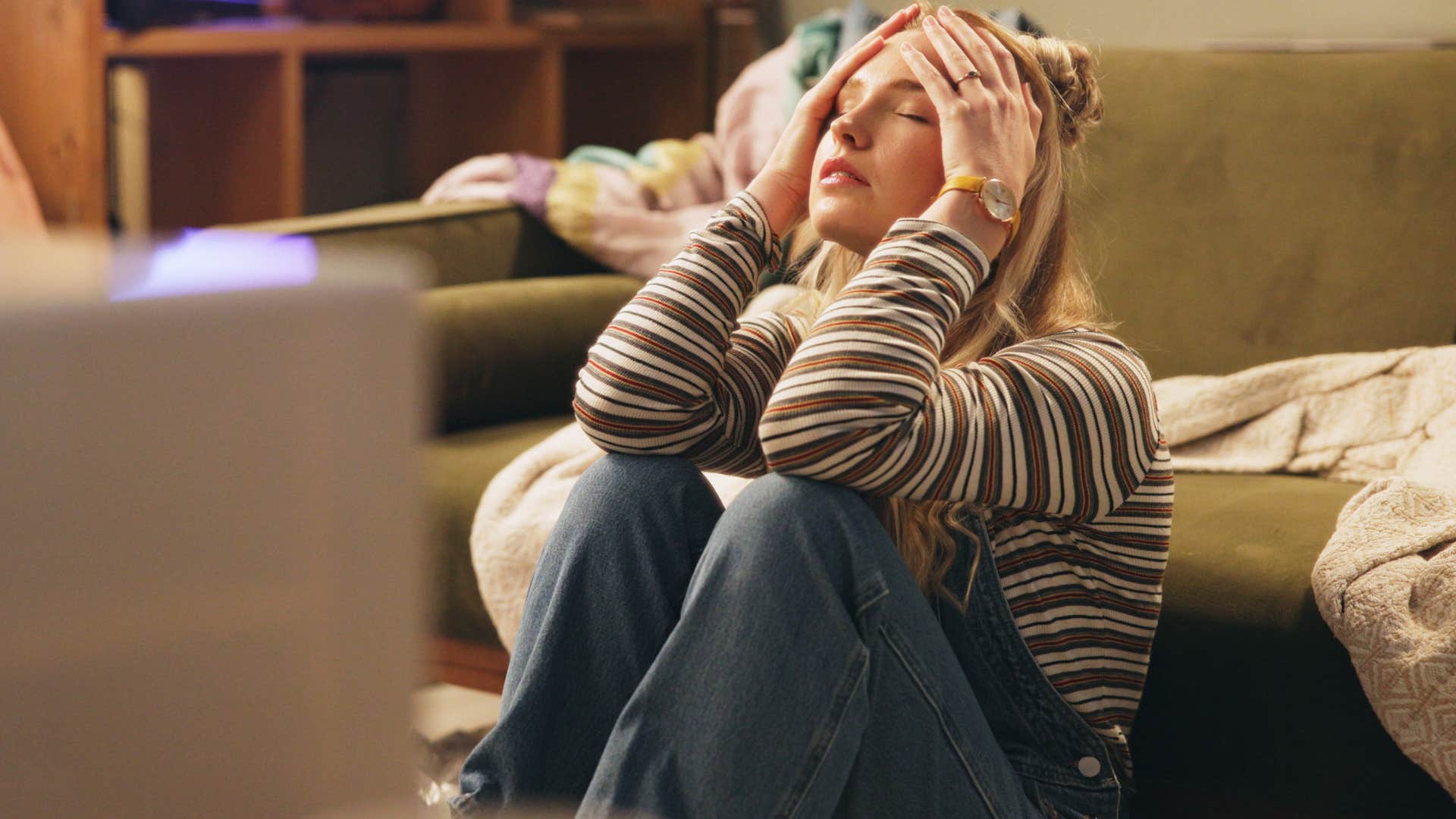 stressed woman who struggles with regulating her emotions
