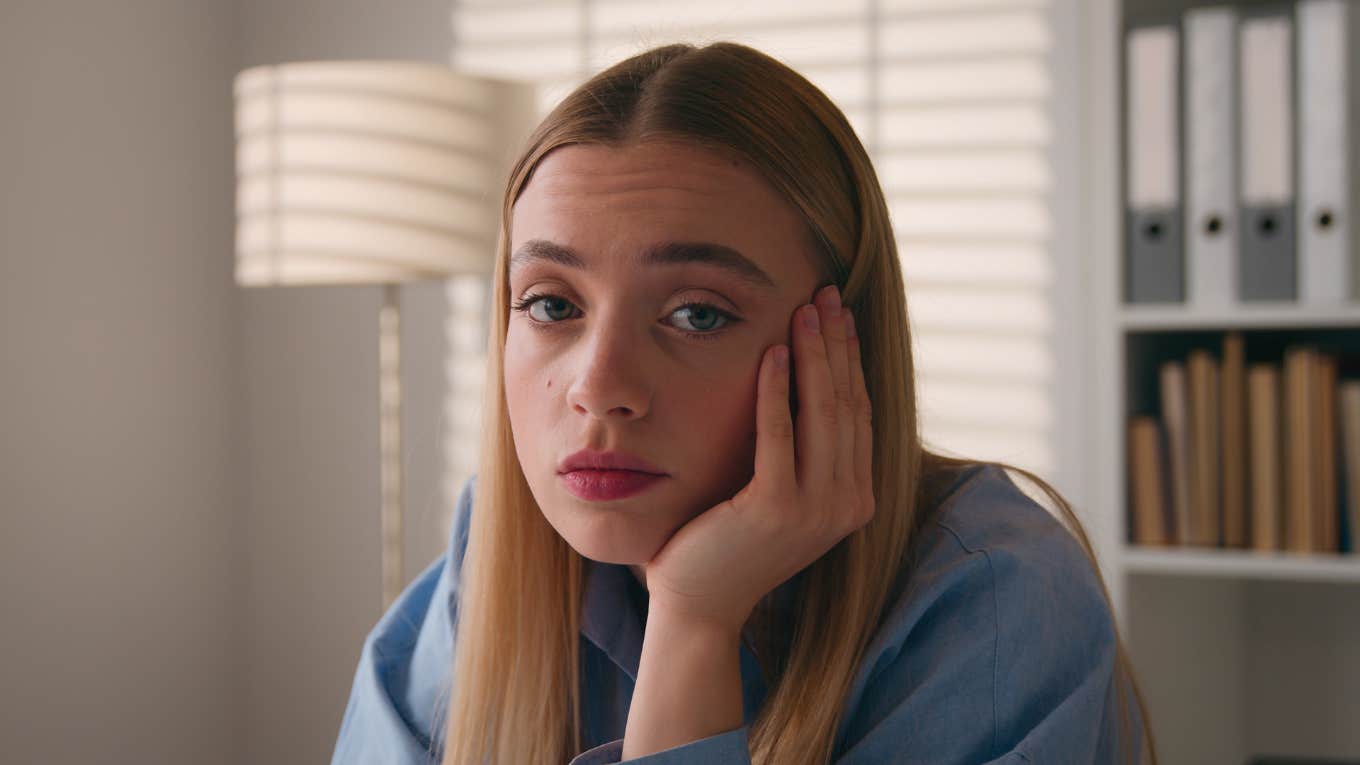 Quiet And Painful Things That Happen When You Don't Feel Close To Your Parents Anymore sad depressed young woman who isnt close with her parents anymore