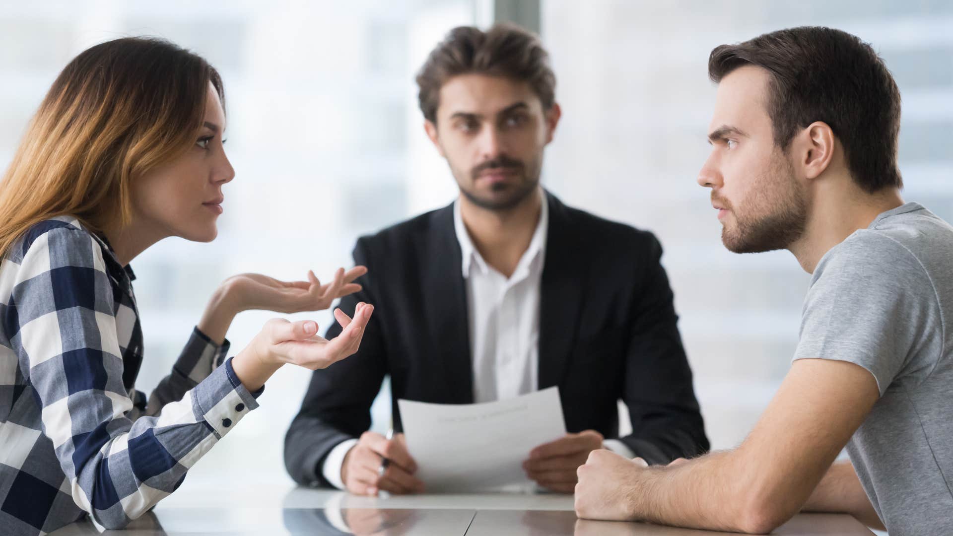 a wife tells her estranged husband that he is right as they meet with their divorce attorney